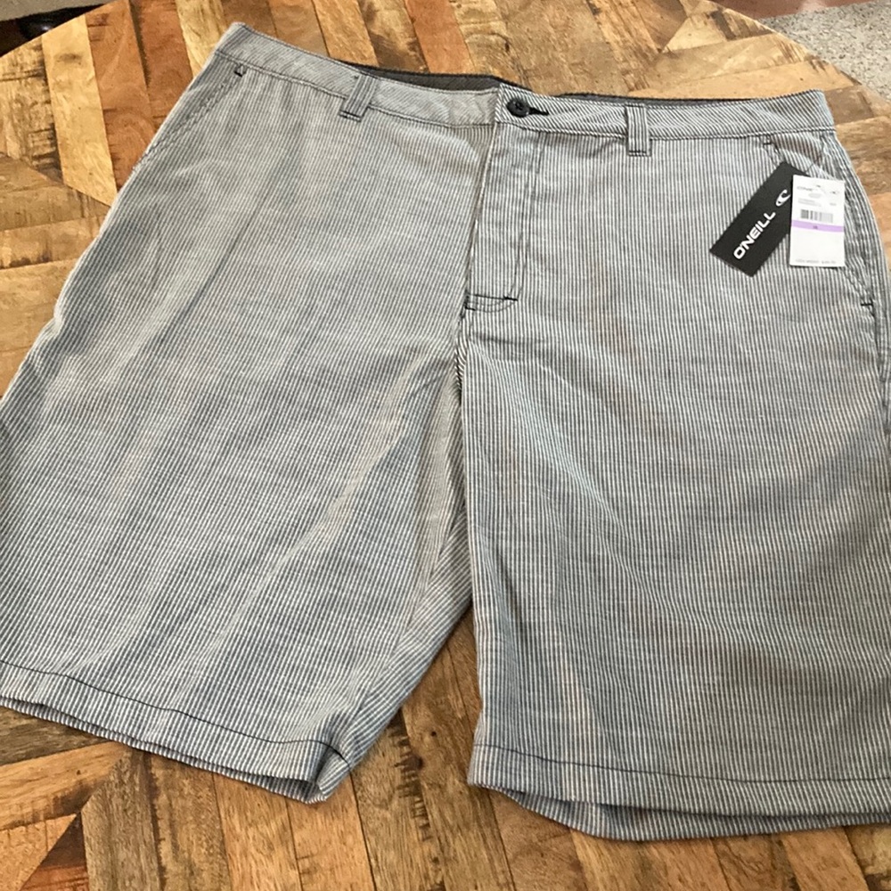 O'Neill Men's Blue and White Pinstripe Shorts—Never worn